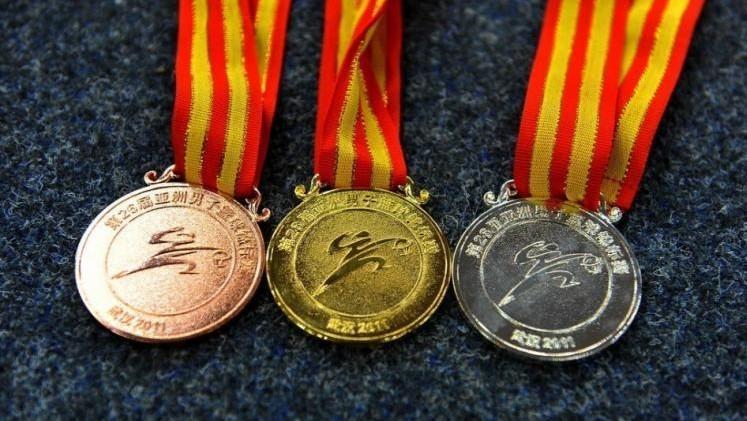 驴打滚儿   ,【转帖图片】男篮亚锦赛奖牌曝光,我怎么觉得这么土颇刎